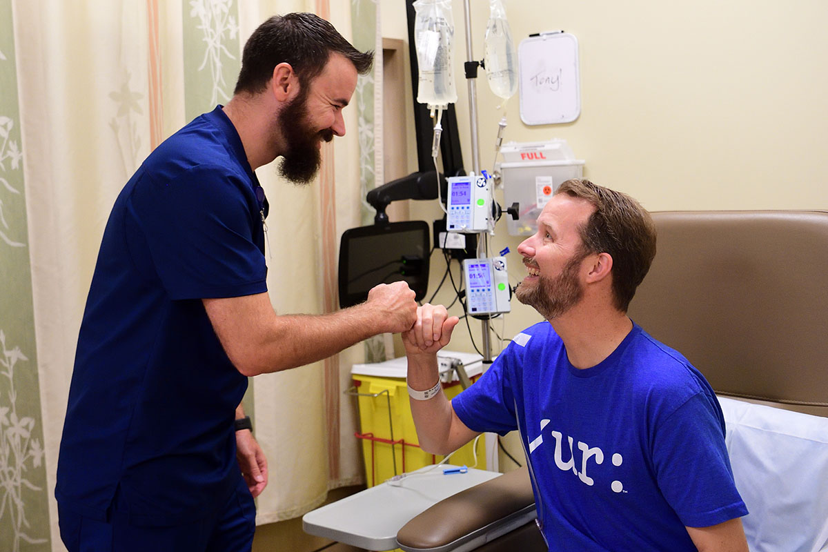 Oncology nurse Tony Zanardo connects with patient Kirk Stephens.