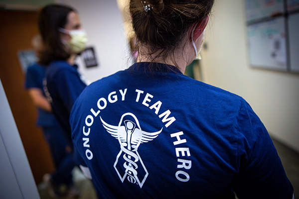 Winship oncology nurses during a team huddle.
