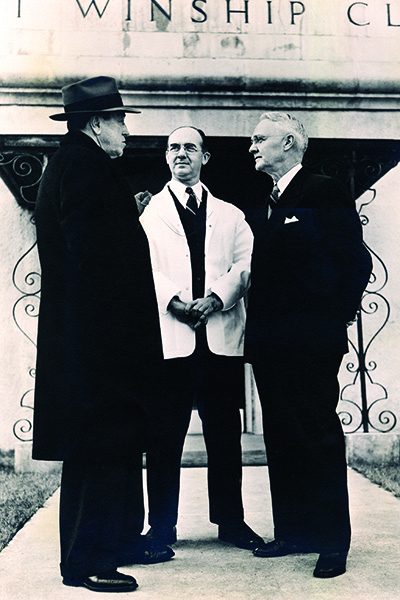 Robert Woodruff with Dr. Elliott Scarborough and Dr. Hugh Wood.