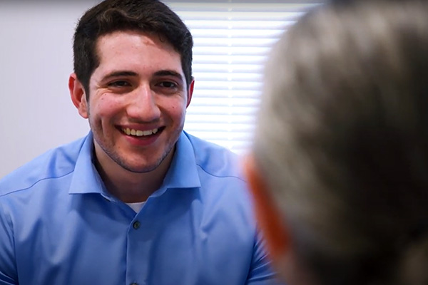 Patient facing doctor during a consultation