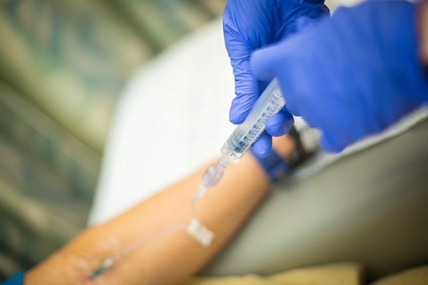 Infusion nurse prepping medication