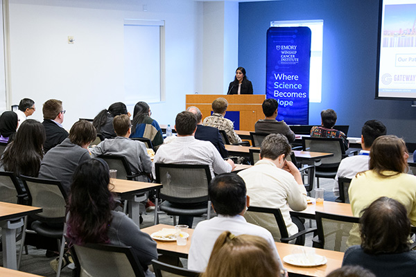 Presenter at podium during a Puri Lecture