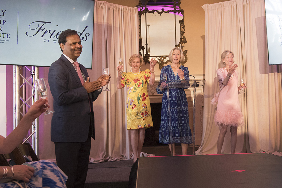 Dr. Ramalingam shares a toast with Fashion a Cure event chairs Missy Craver, Kay Buckham and Susan Flinn.