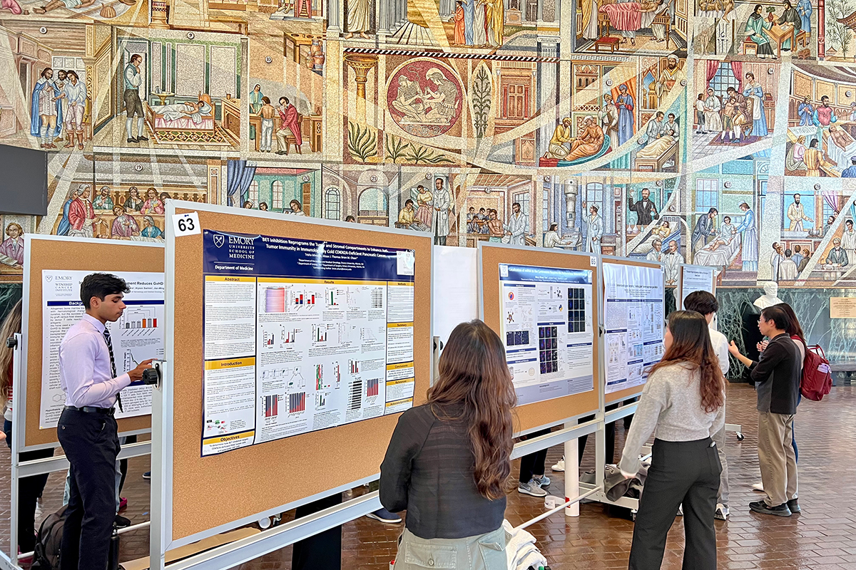 Students and trainees present their work during the evening's poster session at the Woodruff Health Sciences Center Administration Building.