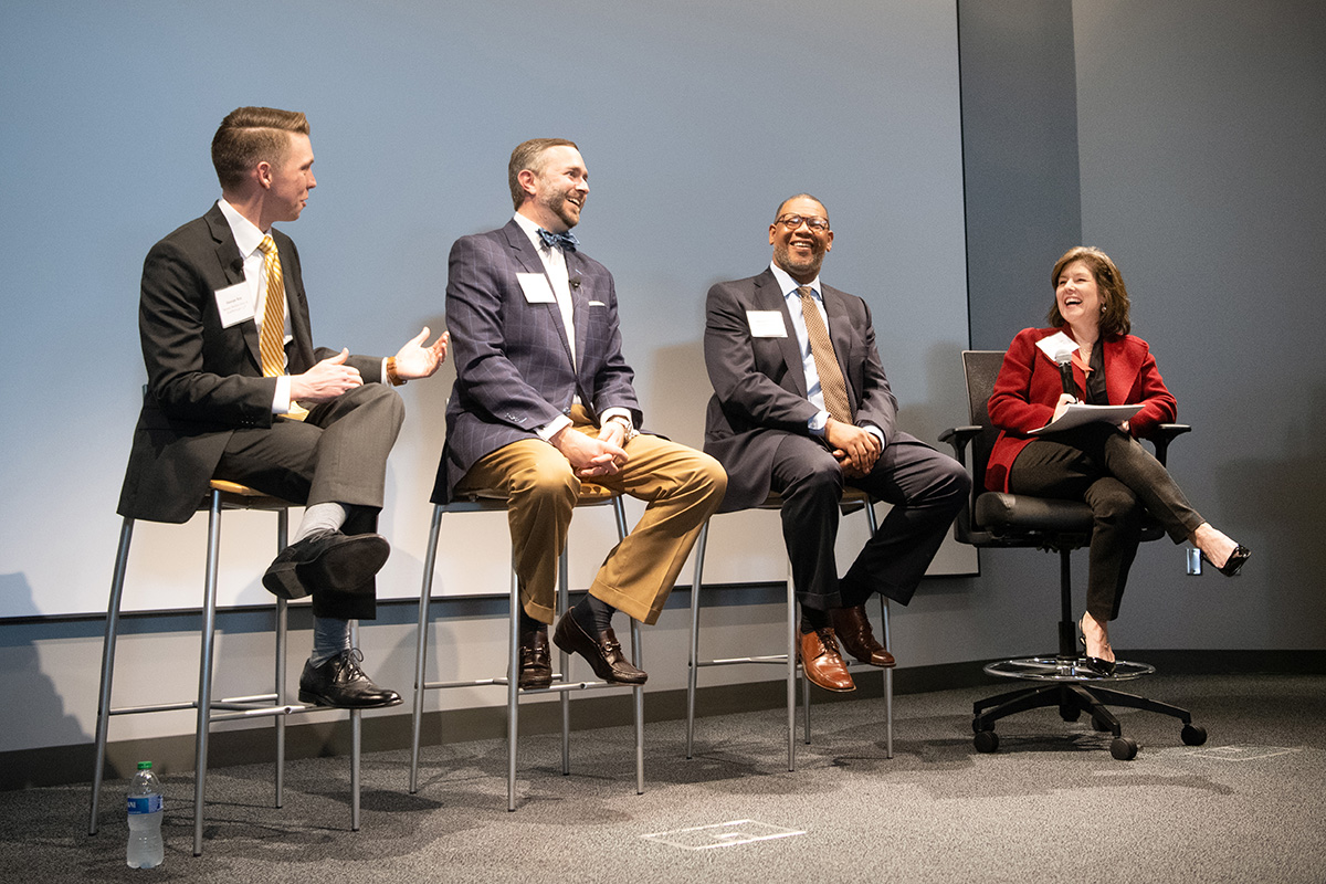 George Ray, JD, Rep. Matt Dubnik, Marcus Downs and Dr. Lynn Durham on stage during panel session