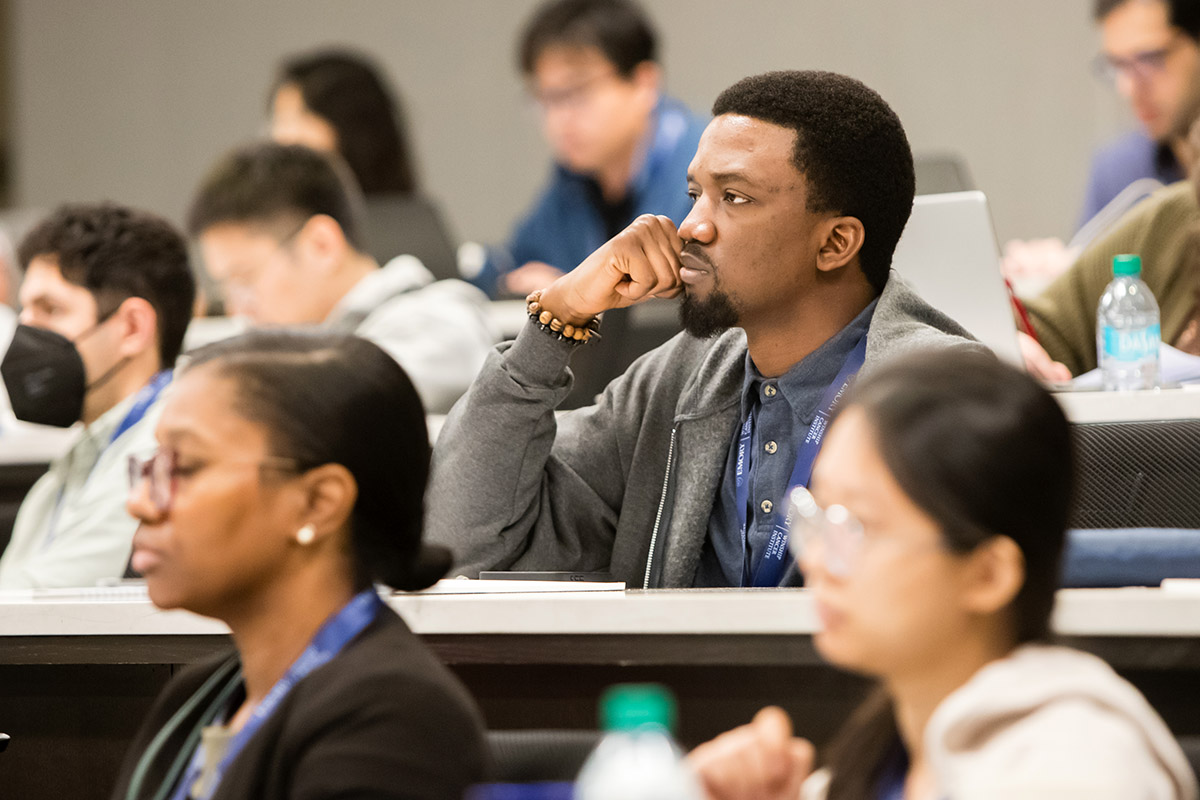 Audience members during a presentation at the 2024 Winship Scientific Symposium.