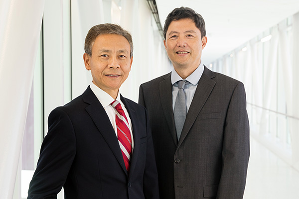 C.K. Qu, MD, PhD and Wei Zhou, PhD