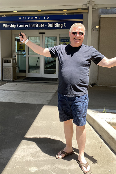 Johan at back entrance to Winship Cancer Institute