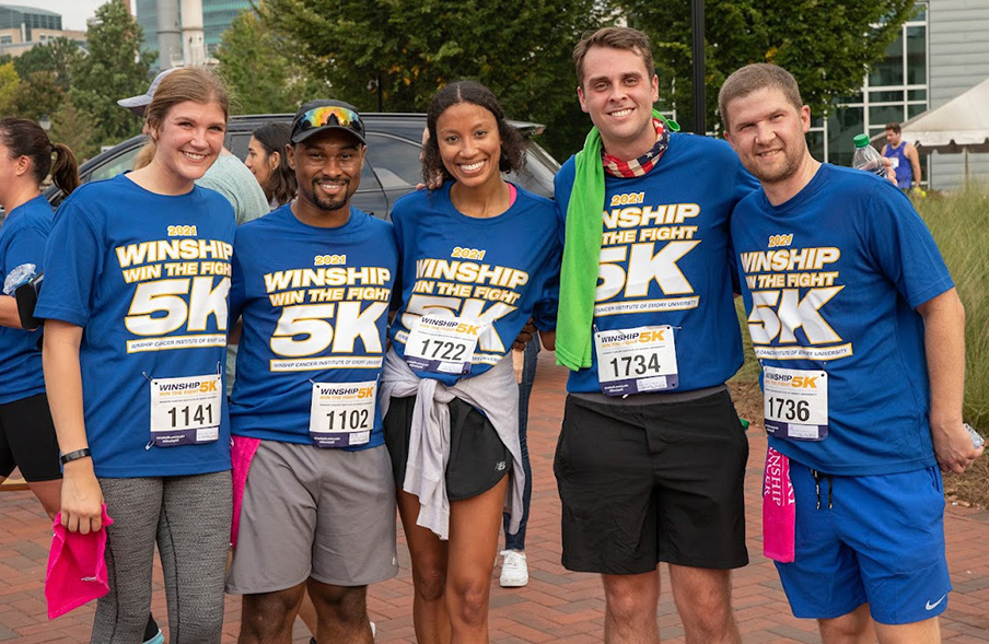 Participants pose outside at the 2022 Winship 5K