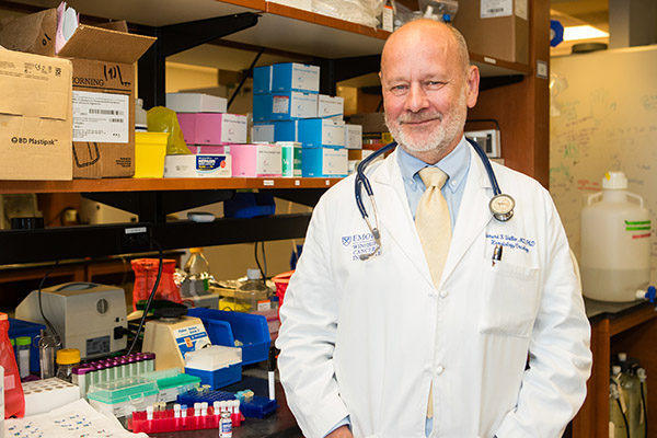 Edmund K. “Ned” Waller, MD, PhD, stands in his laboratory.